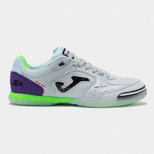 Sky Blue sneaker with green sole and purple accents on a white background